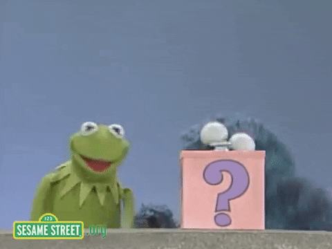 un gif cu personaje din Sesame Street și un semn de întrebare