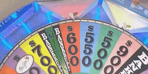 The iconic multi coloured segmented Wheel of Fortune just missing the bankrupt space and landing on the highly sough after million spot.