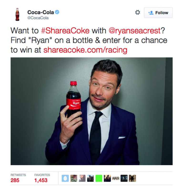 An example of the #shareacoke campaign featuring Ryan Seacrest holding a bottle with his name on. 