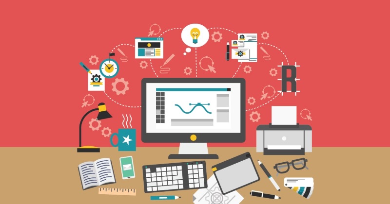 Ordinateur entouré de graphiques représentant différentes étapes de conception