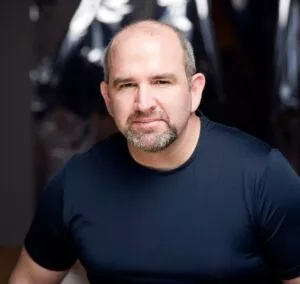 Headshot do especialista em integração de comércio eletrônico Wayne Thompson da Vendasta